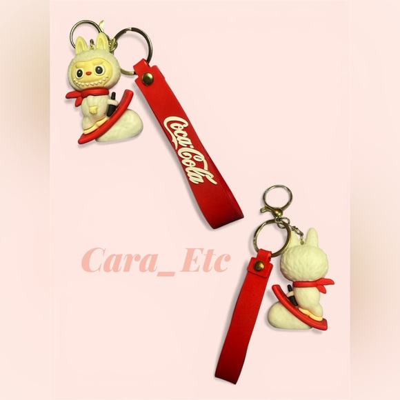 Coca Cola Accessories - Coca-Cola Red Strap Keychain with White Monster Charm